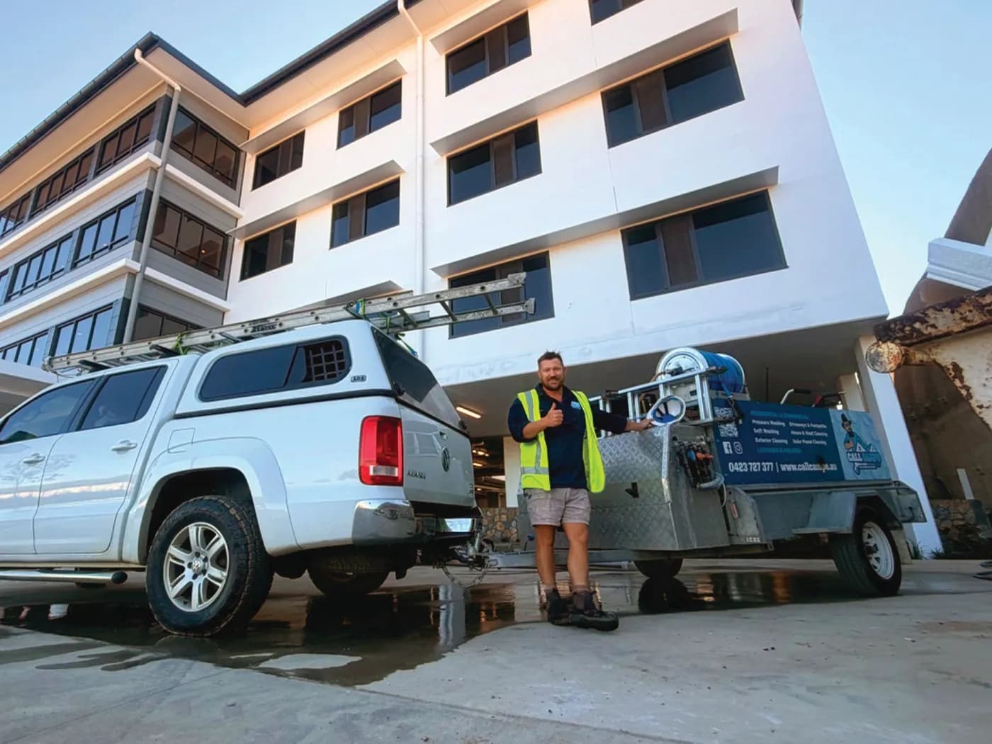 Joel from Call Campo with the ute and rig outside a commercial building in Gladstone